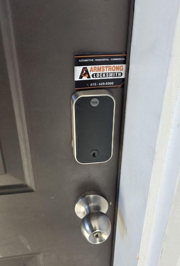 Armstrong Locksmith installing Yale smart keypad touchscreen deadbolt in Belle Meade Nashville TN 37205